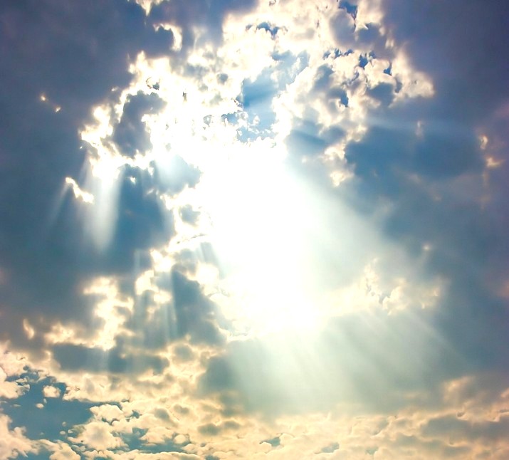 Cloudy sky with beams of light